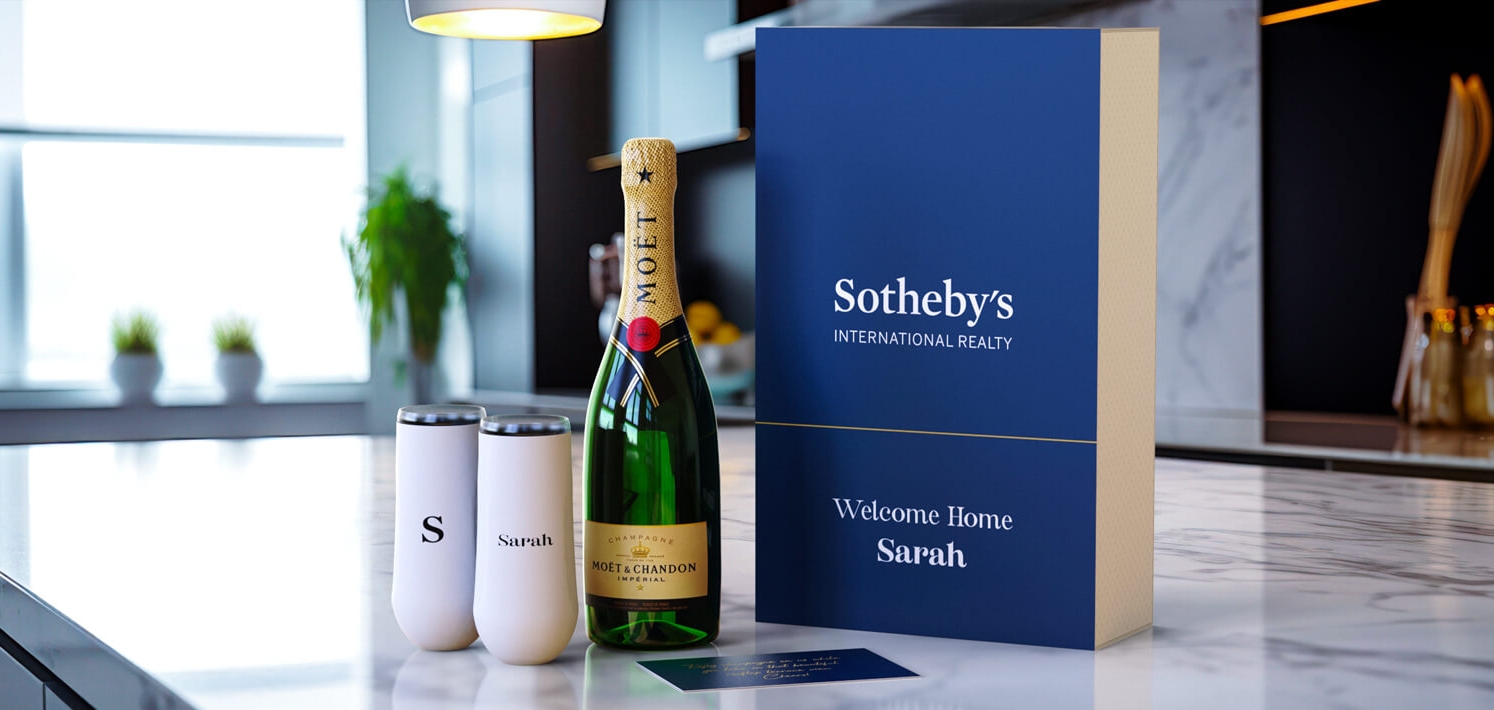 Insulated champagne flutes and bottle in a beautifully crafted gift box.